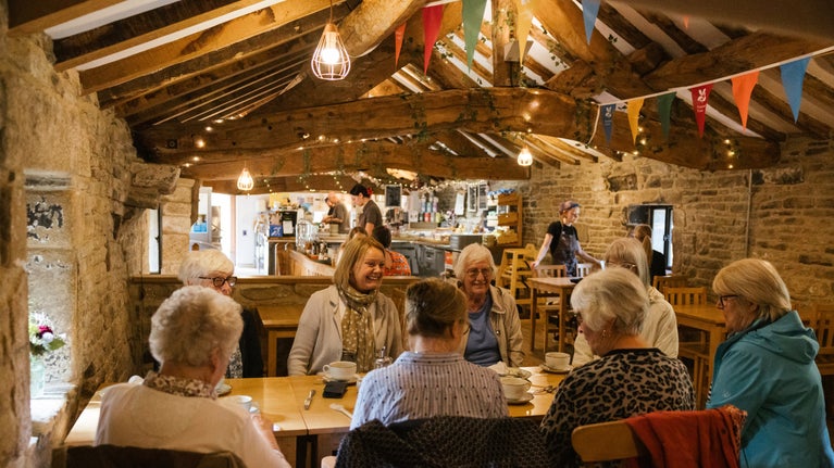 Visitors in the tearoom at East Riddlesden Hall, Yorkshire
